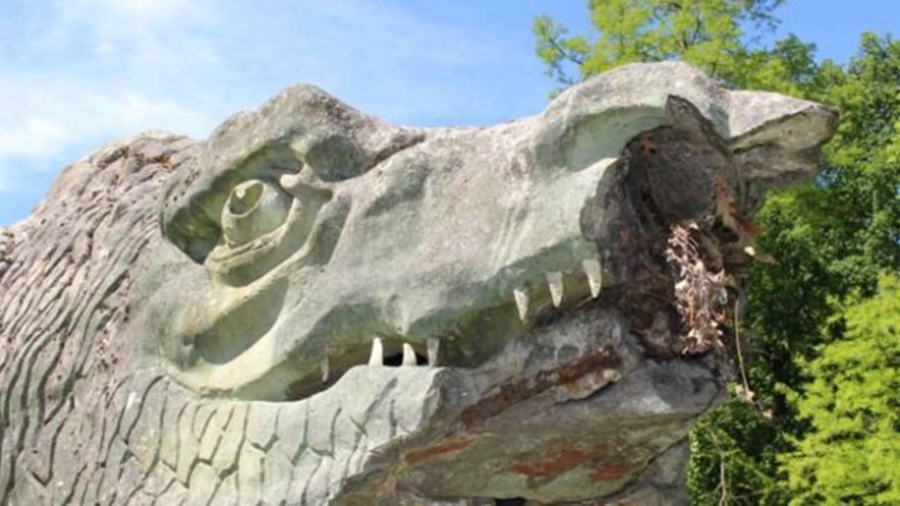 The Megalosaur statue has had damage to part of its mouth and nose (Picture: Friends of Crystal Palace Dinosaurs)